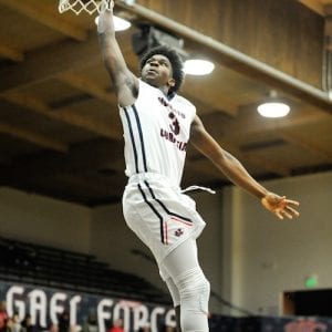 ModestoChristian #3, Aaron Murphy of the Crusaders goes for another highlight dunk. Sam 